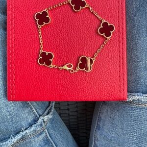 Elegant Gold and Red Clover Bracelet